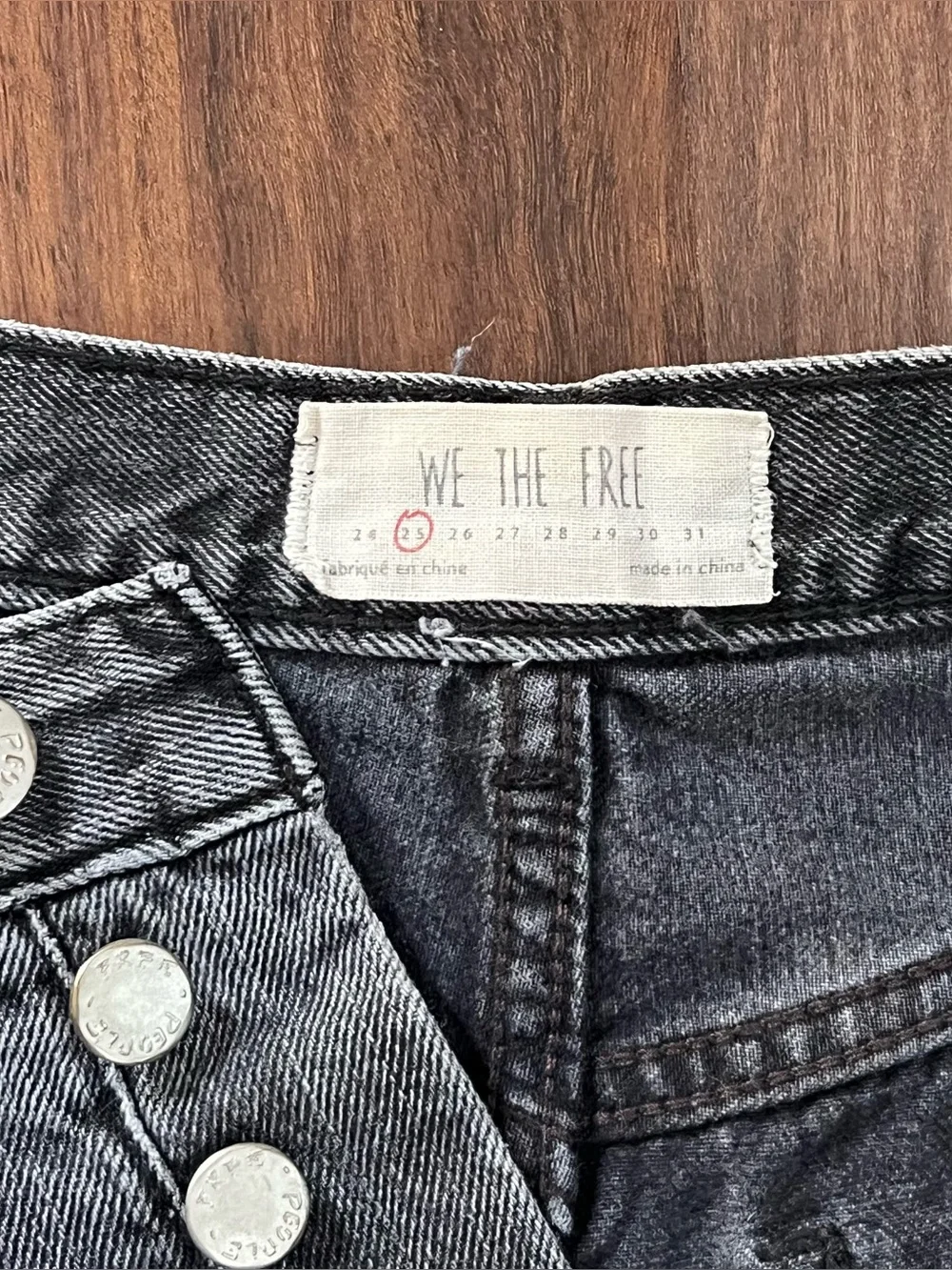 Free People black/charcoal low rise button fly denim cut off mini shorts